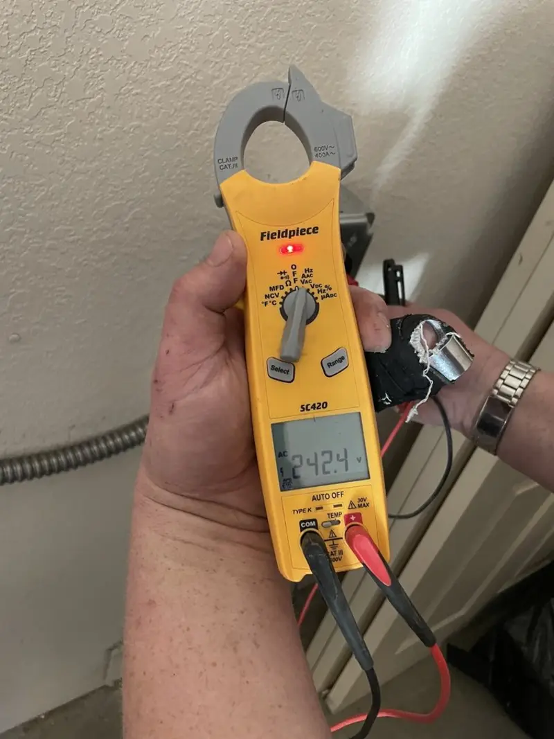 Voltage testing with clamp meter during Electrical Installation Services in Salton City
